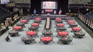 Tables set up in arena.